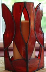 red abstract candle holder